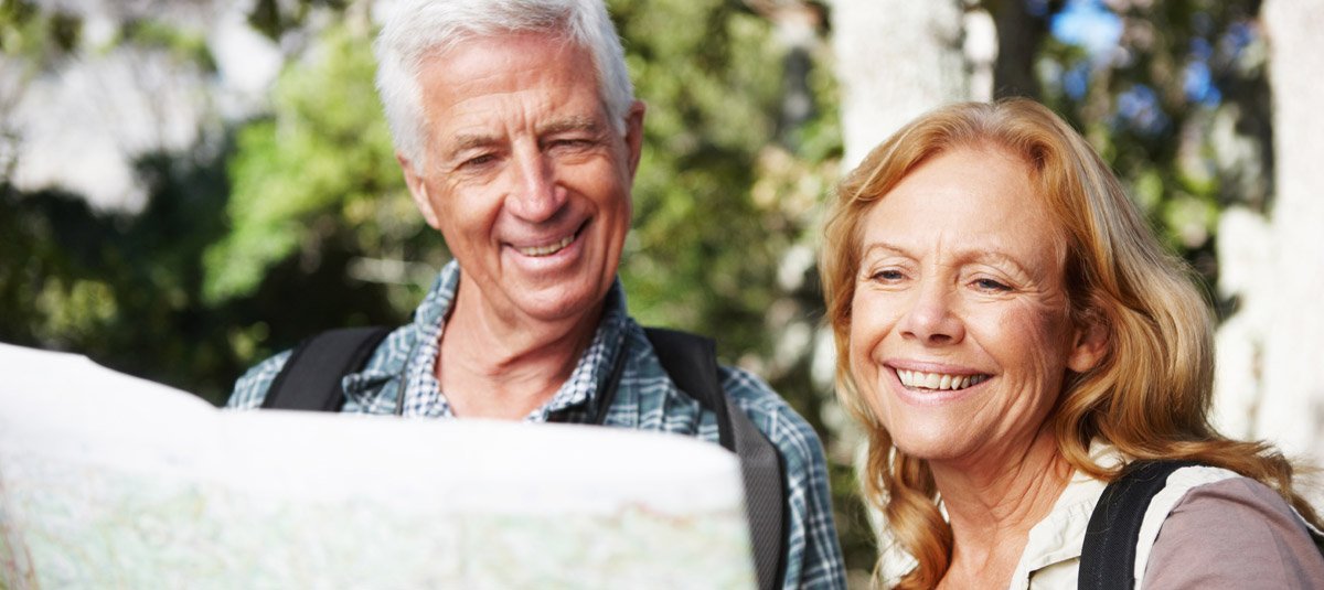 old-couple-looking-at-map